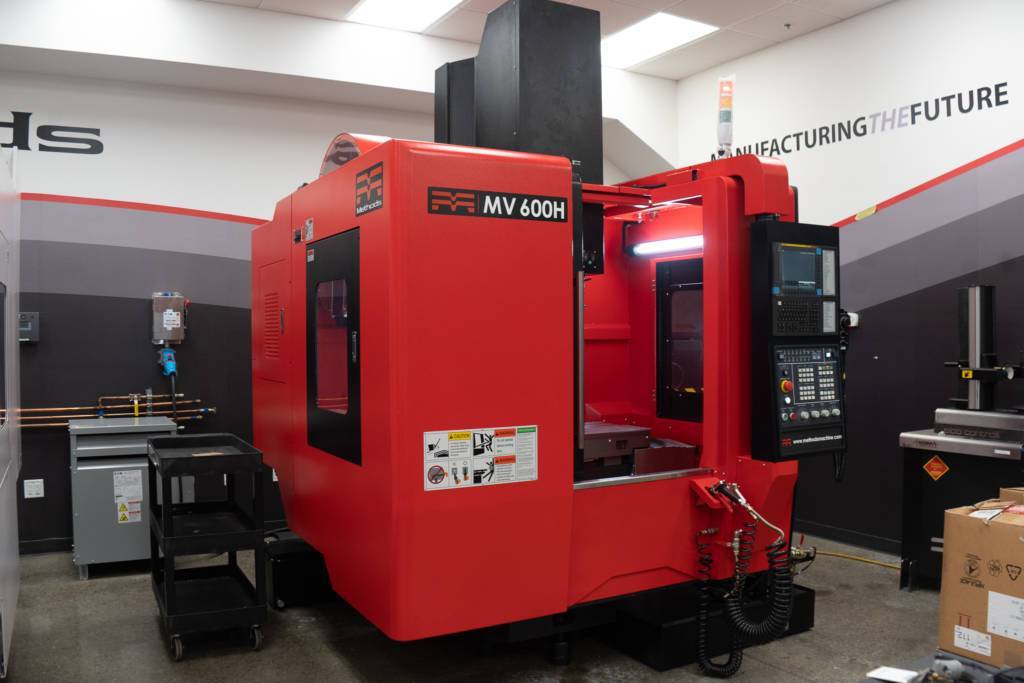 Methods MV 600H - Vertical CNC Machining Center | Methods Machine Tools front corner view of the Methods MV 600H vertical CNC machining center built by Methods Machine Tools